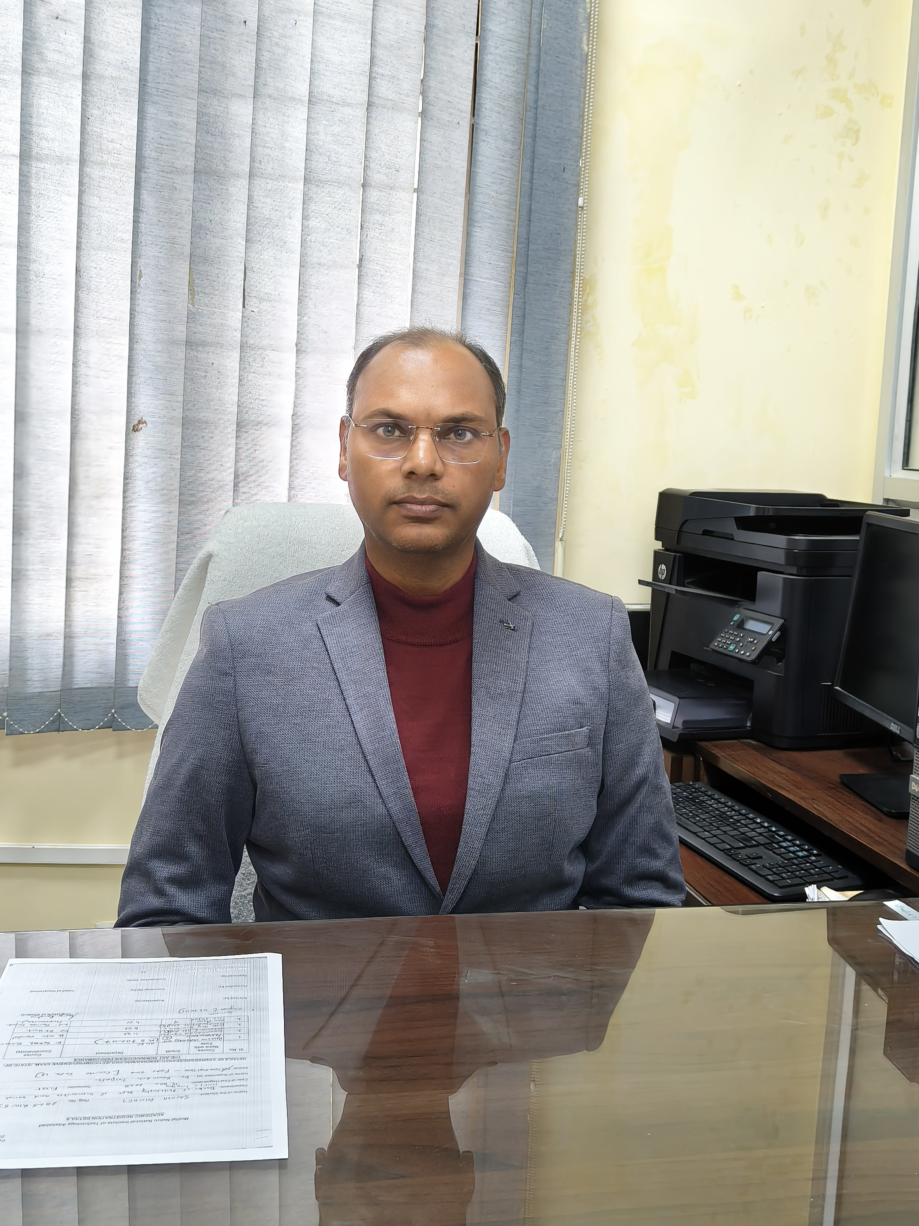 Dr. Ravindra Tripathi